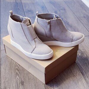 Comfortable, cushioned, high-top wedge sneakers.